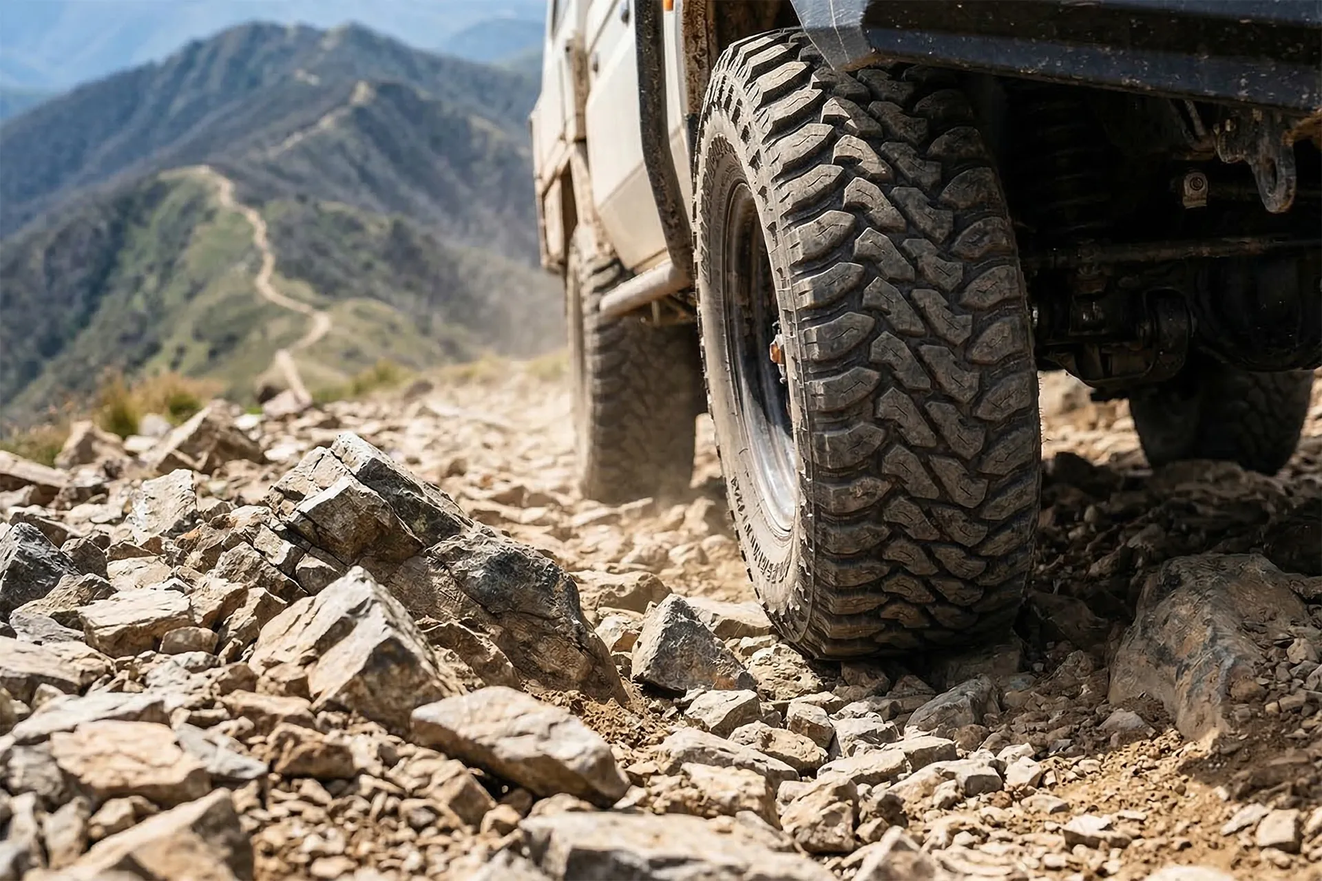 Close-up of a 4WD tyre navigating rocky terrain on Blue Rag Range Track in the Victorian High Country.