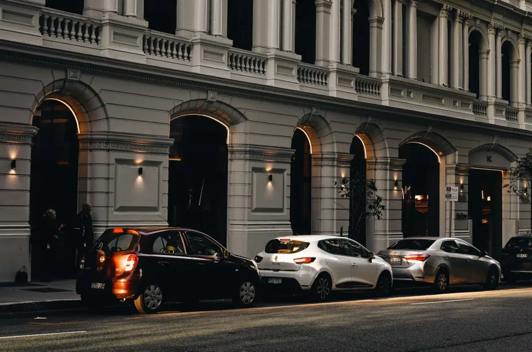 cars parked on an Australian city street representing the everyday cost of car ownership in Australia