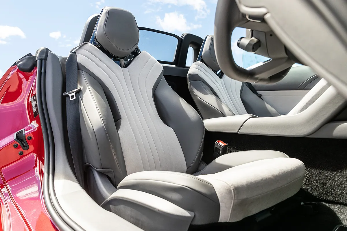 MG Cyberster GT interior with white seats and futuristic electric cockpit design