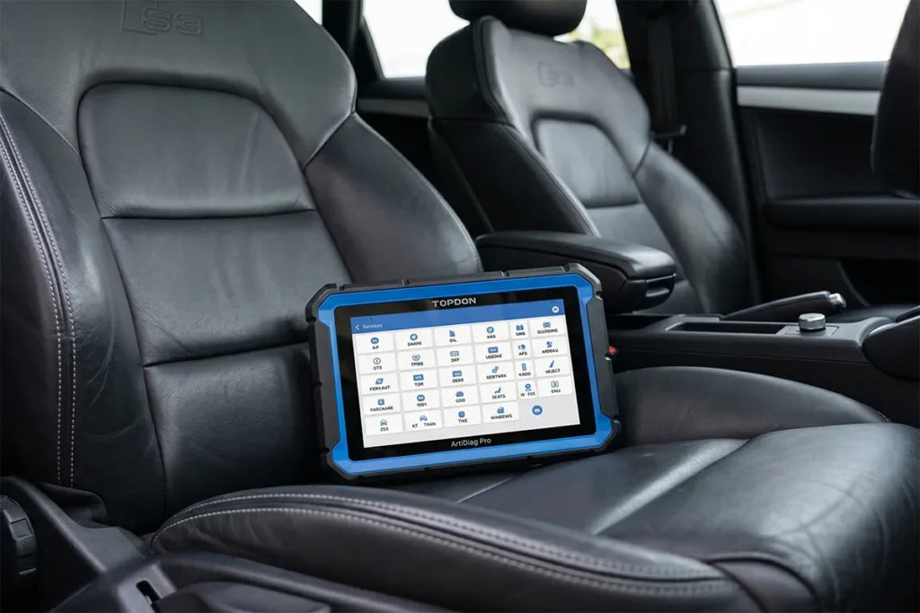 Close-up of the TOPDON ArtiDiag Pro tablet displaying its 35 maintenance service functions