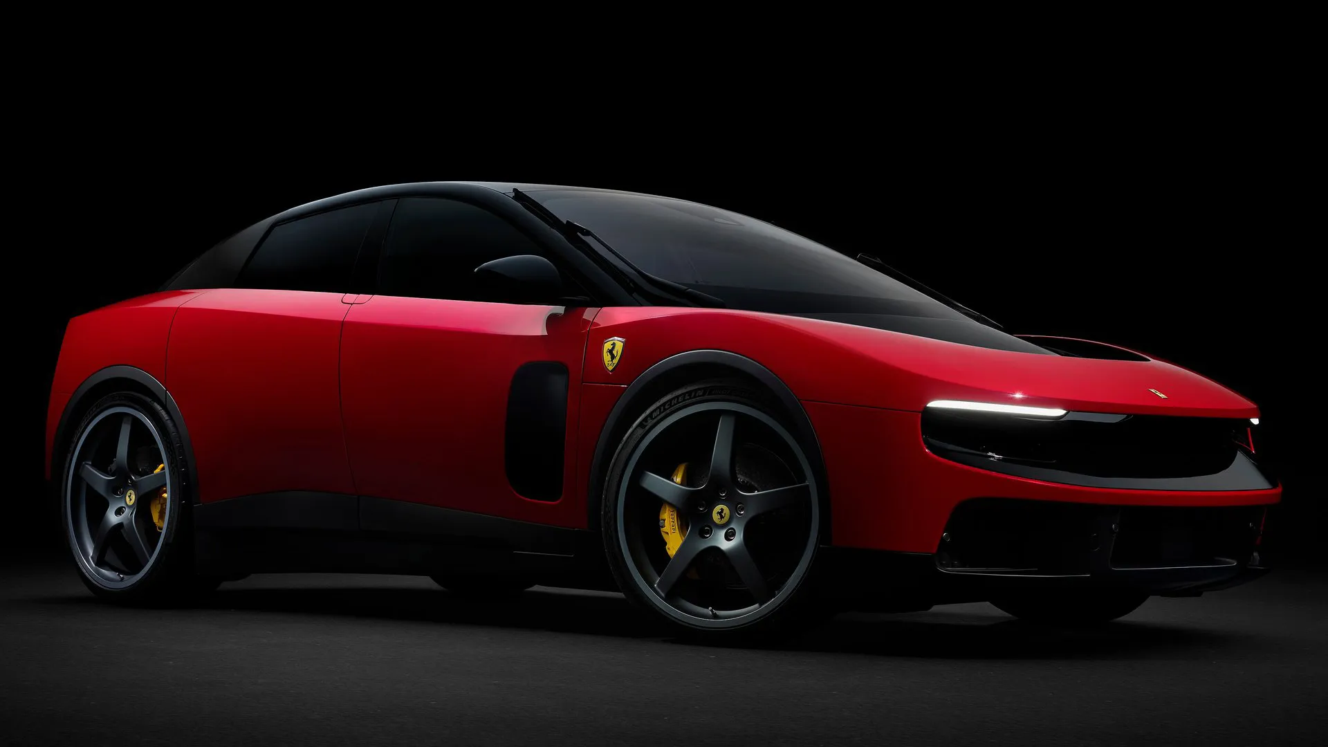 ferrari-luce-red-front-three-quarter-studio Ferrari Luce in Rosso Corsa red on black studio background, front three-quarter angle showing floating nose and DRL strip