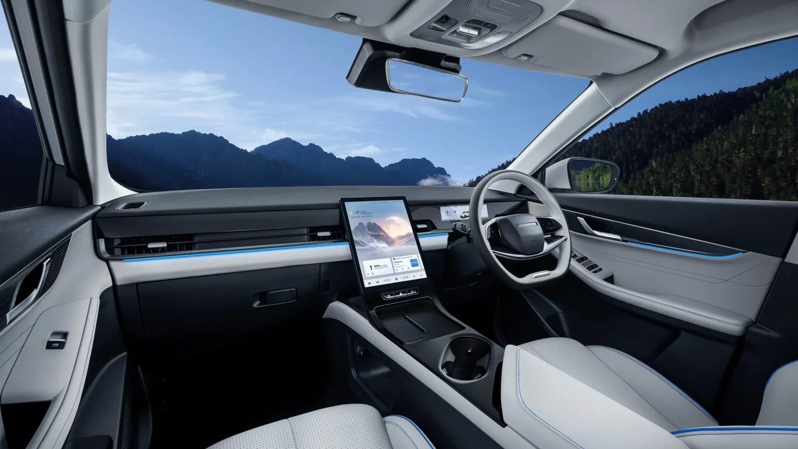 interior wide shot of Jaecoo J5 in valley of mountain