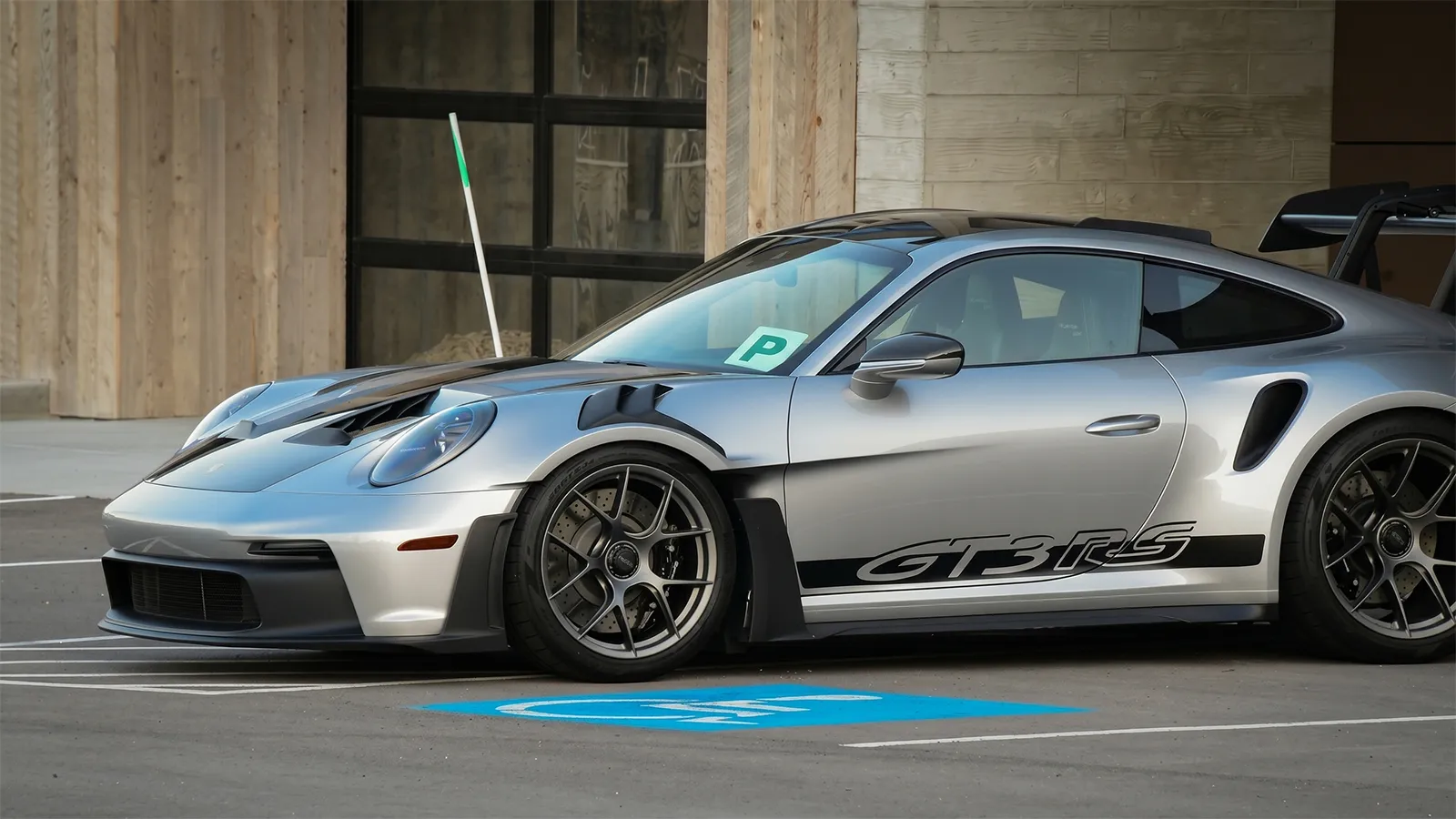Silver Porsche 911 GT3 RS parked in a bay, a 375kW supercar legally driveable by P-platers in the ACT despite its power