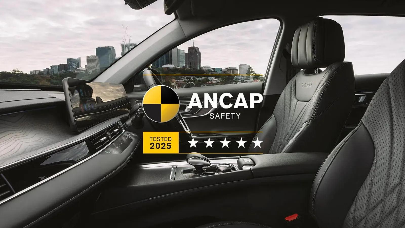 chery-ancap-stars An image looking inside a car interior, with a large, superimposed digital graphic overlay featuring a five-star ANCAP rating, the