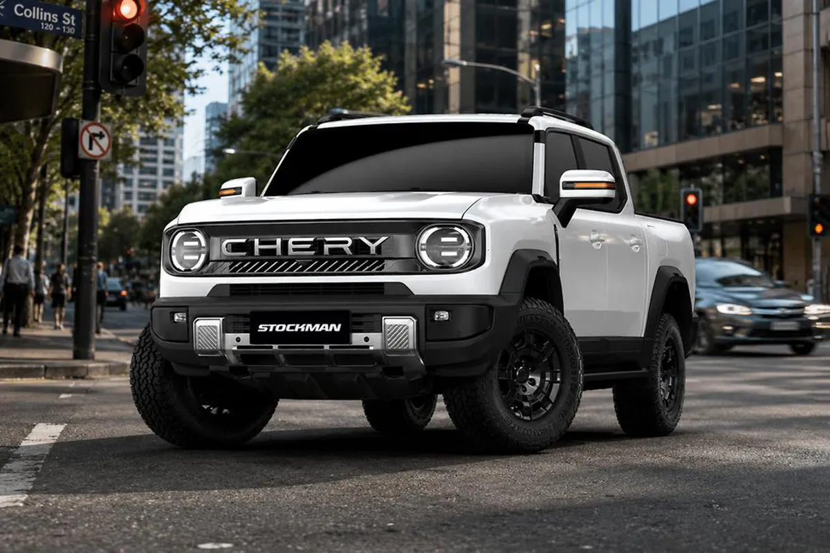 White Chery Stockman dual-cab ute stopped at a Melbourne city intersection on Collins Street, front three-quarter view