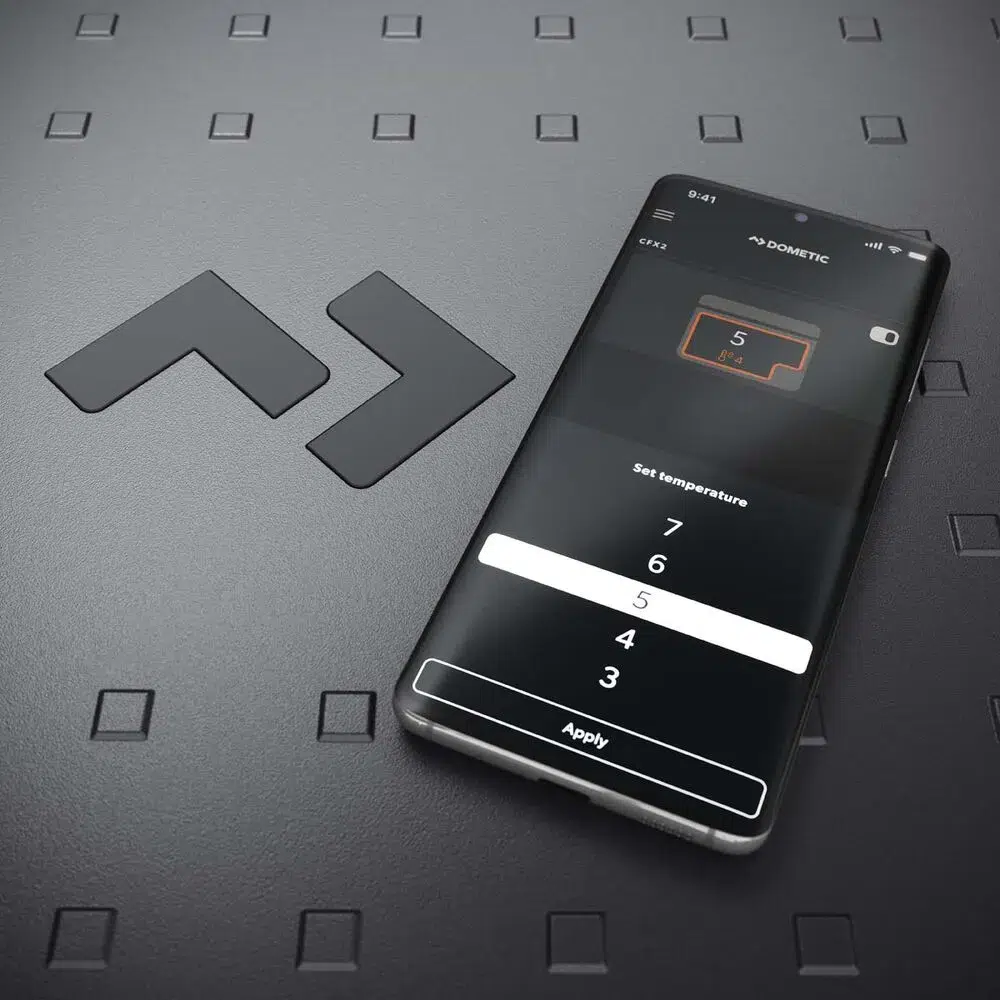 Dometic app on a smartphone setting the CFX5 55's temperature via Bluetooth