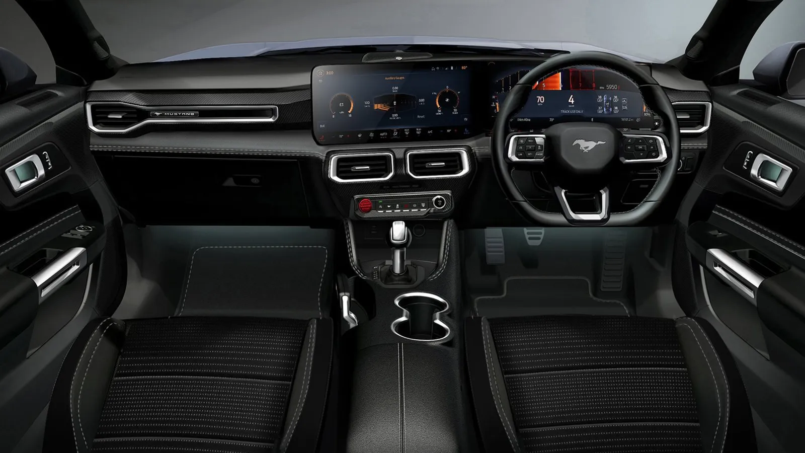 Ford Mustang S650 right-hand drive interior showing dual digital screens, automatic gear selector, and red engine start button