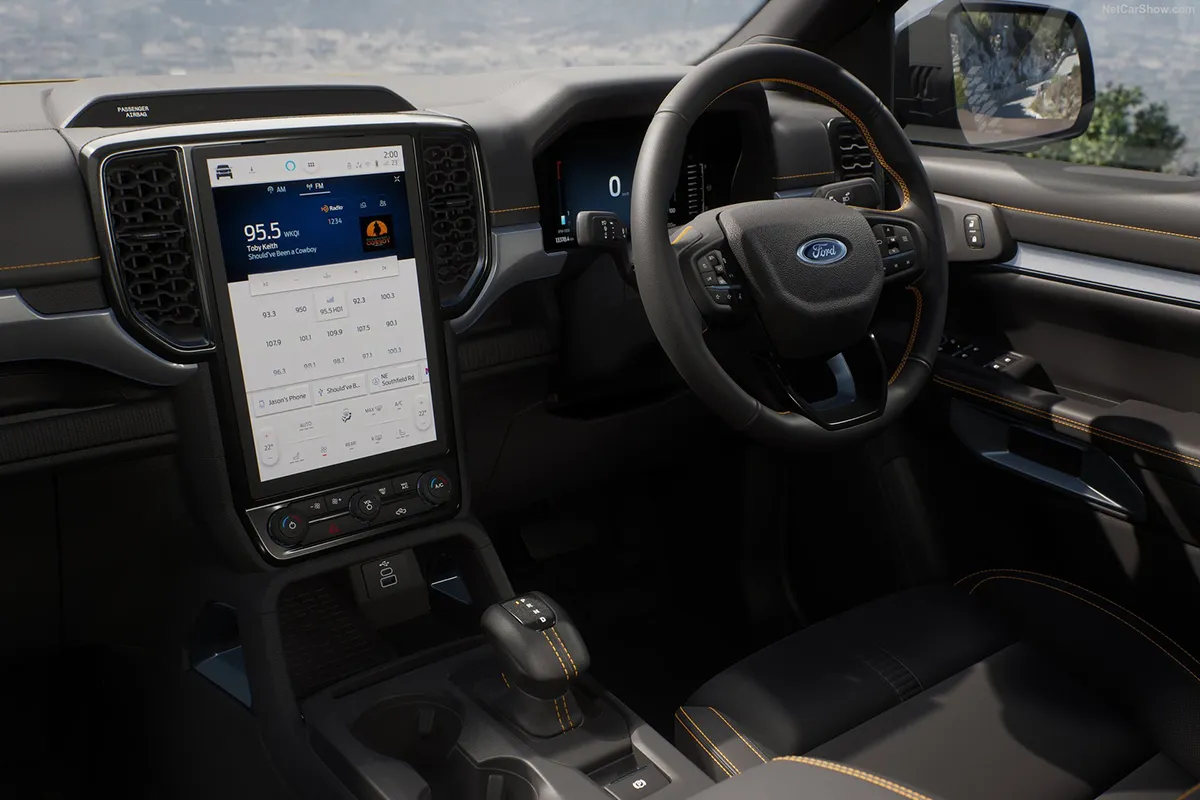 Ford Ranger Wildtrak interior with portrait touchscreen and leather steering wheel