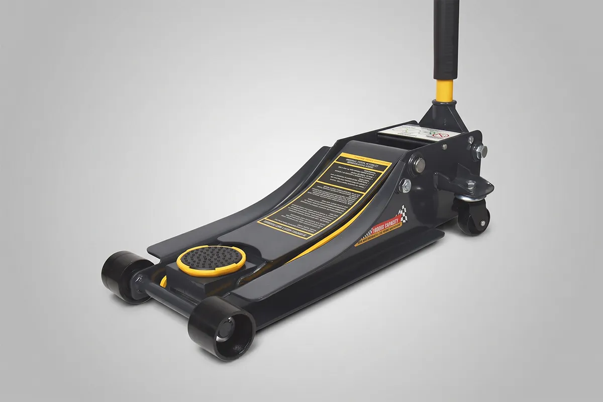 Black and yellow 1800kg low-profile trolley jack with wide low-clearance frame, product shot grey background