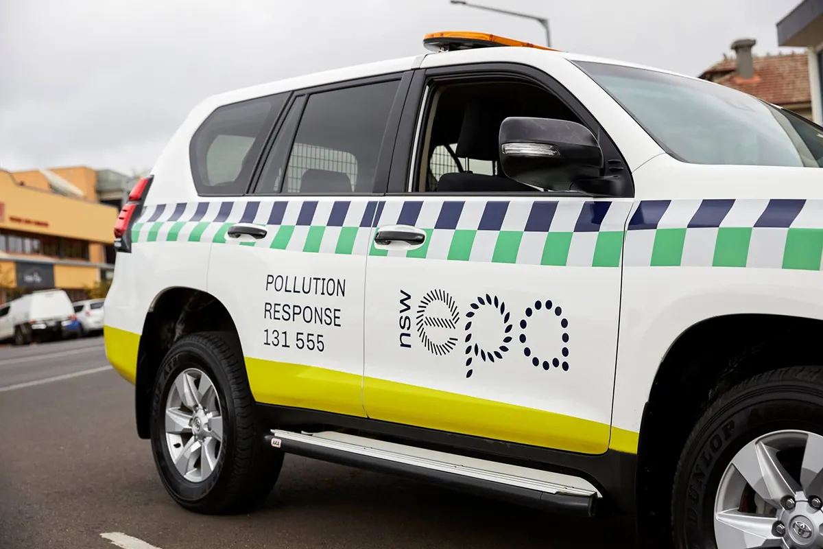 White EPA NSW Environment Protection Authority vehicle photographed from the side showing its livery