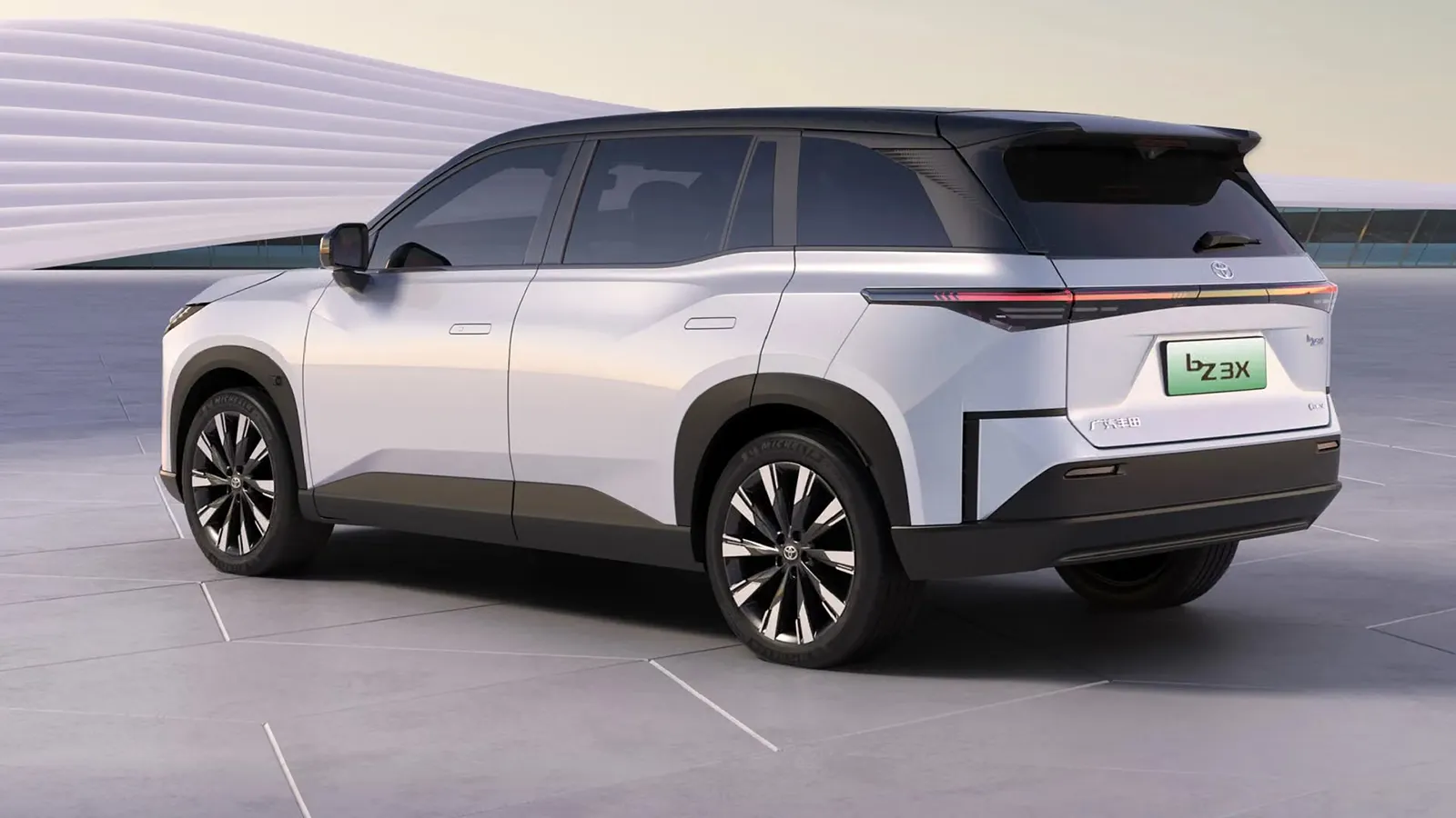 Toyota bZ3X electric SUV in white, rear three-quarter view showing the GAC Toyota badge and bZ3X plate