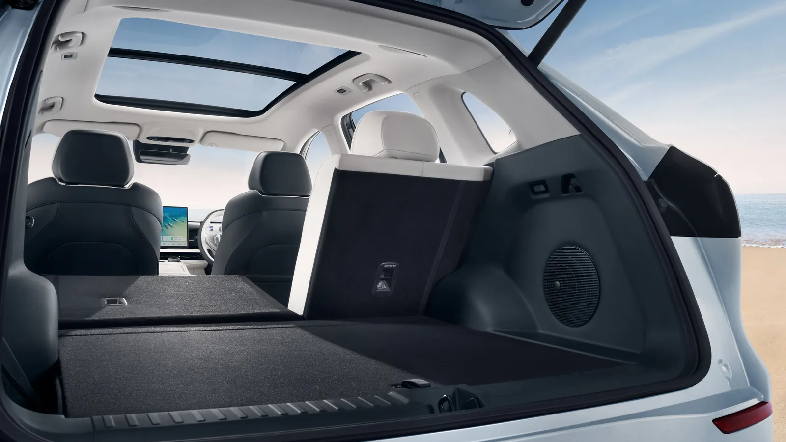 Geely EX5 boot with the rear seats folded flat, viewed from the open tailgate