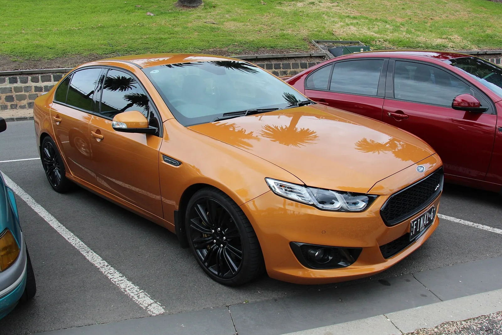 2016 Ford FG X Falcon XR6 Sprint sedan in Victory Gold with black wheels in a car park