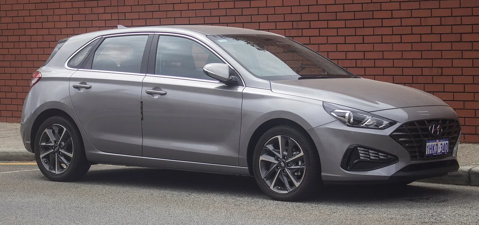 2021 Hyundai i30 Elite hatchback, facelifted PD series, parked kerbside, front three-quarter view
