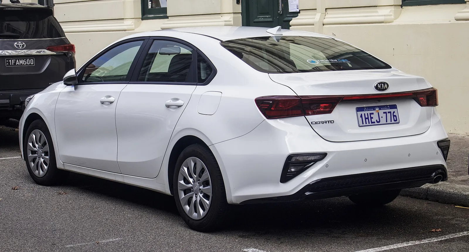 Rear three-quarter view of a 2020 Kia Cerato S sedan (BD series) parked in Fremantle, Western Australia