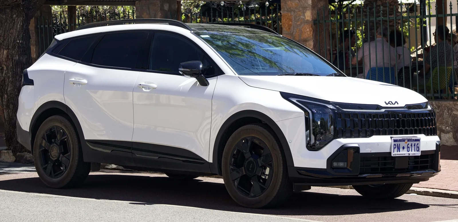 White facelifted Kia Sportage GT-Line with black wheels parked in York, Western Australia