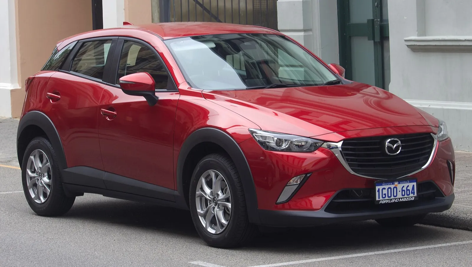 2018 Mazda CX-3 Maxx Sport 2WD small SUV (DK series) parked kerbside, front three-quarter view