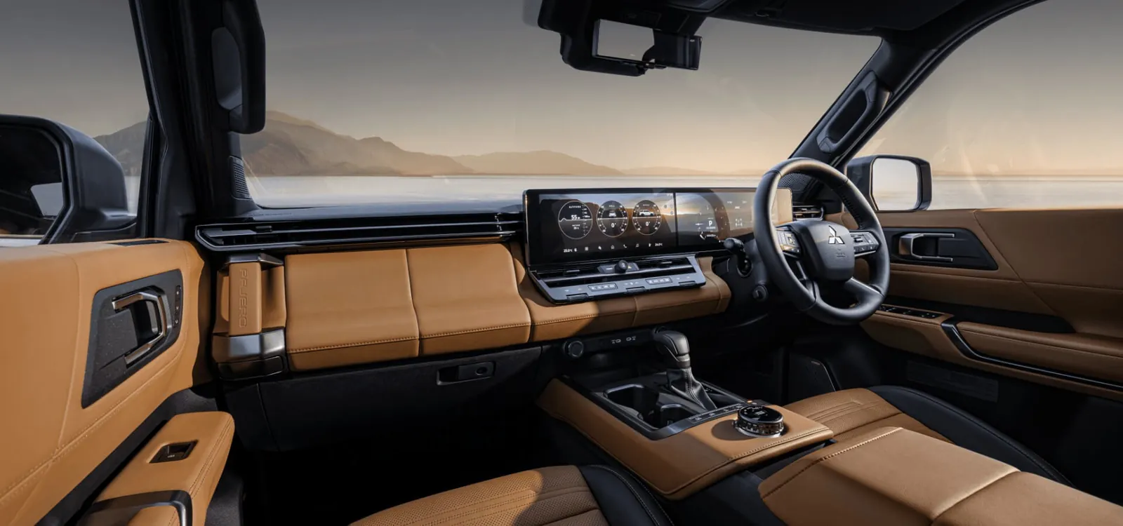 Dashboard of the 2027 Mitsubishi Pajero GSR with twin 14.3-inch screens and camel leather trim