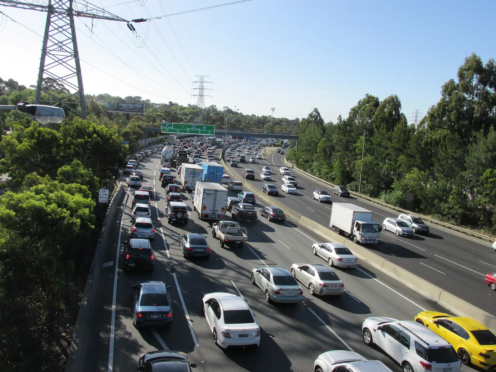 Heavy peak-hour traffic on the Monash Freeway in Melbourne, cars queued across several lanes