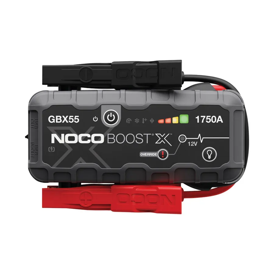 NOCO Boost X GBX55 1750A lithium jump starter with red and black clamps and the override button visible