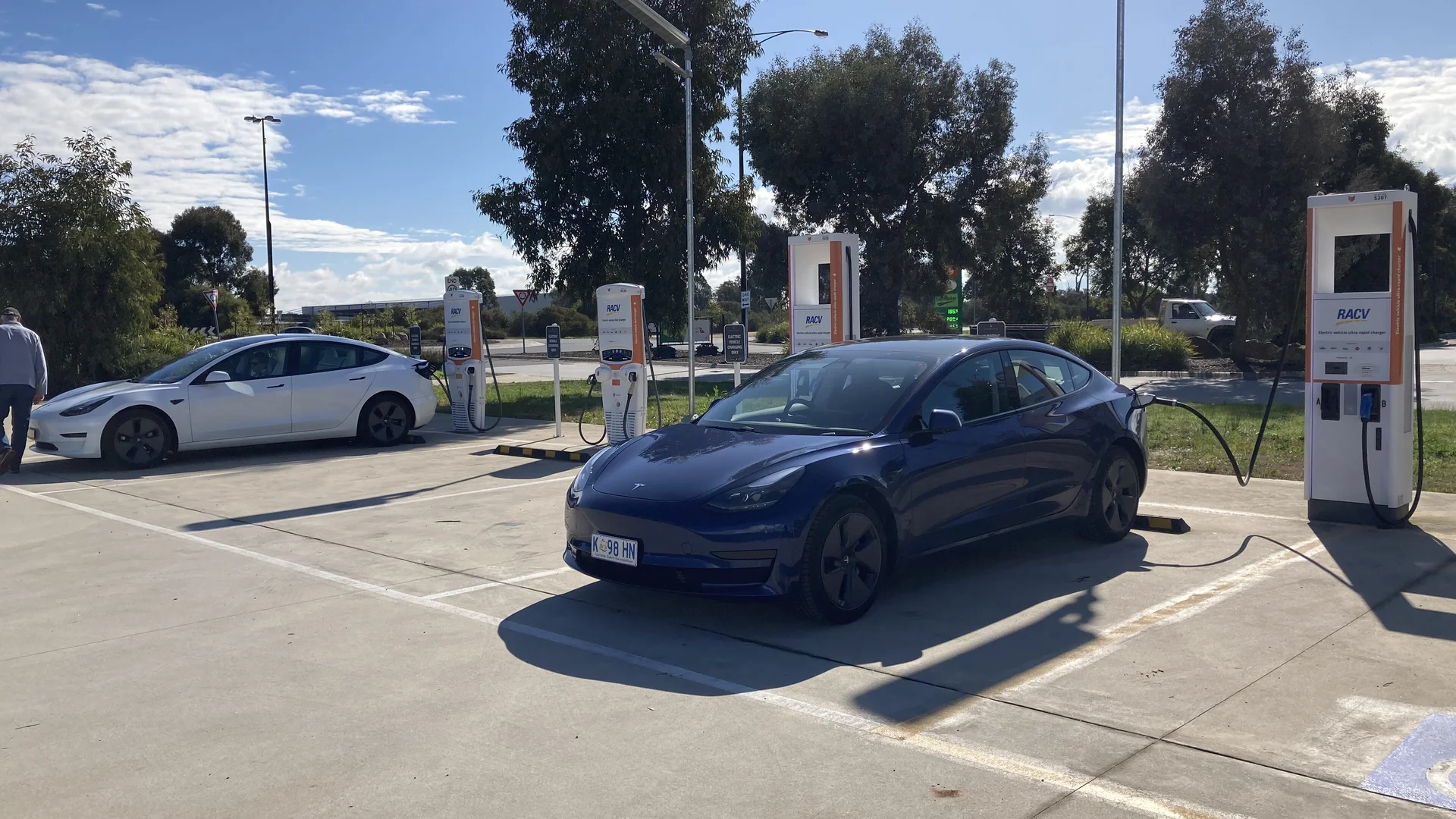 Tesla Model 3s charging at Chargefox Barnawartha North Two Tesla Model 3 electric cars charging at the RACV Chargefox ultra-rapid station at Barnawartha North on the Hume, Victoria