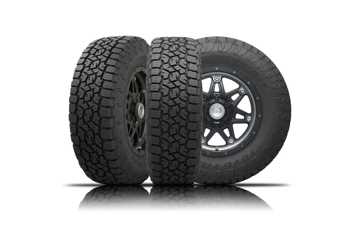 Three Toyo Open Country A/T III all-terrain tyres shown from tread, side and wheel angles