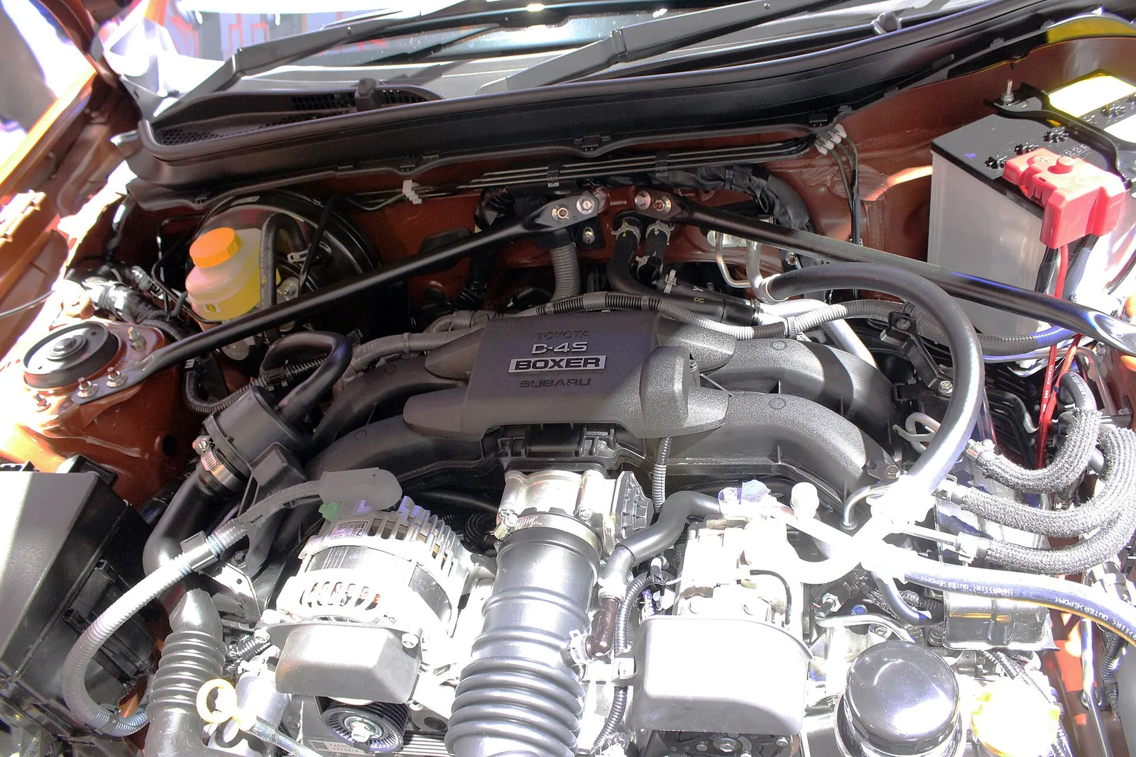 Engine bay of a 2016 Toyota 86 showing the FA20 2.0-litre D-4S boxer four-cylinder engine