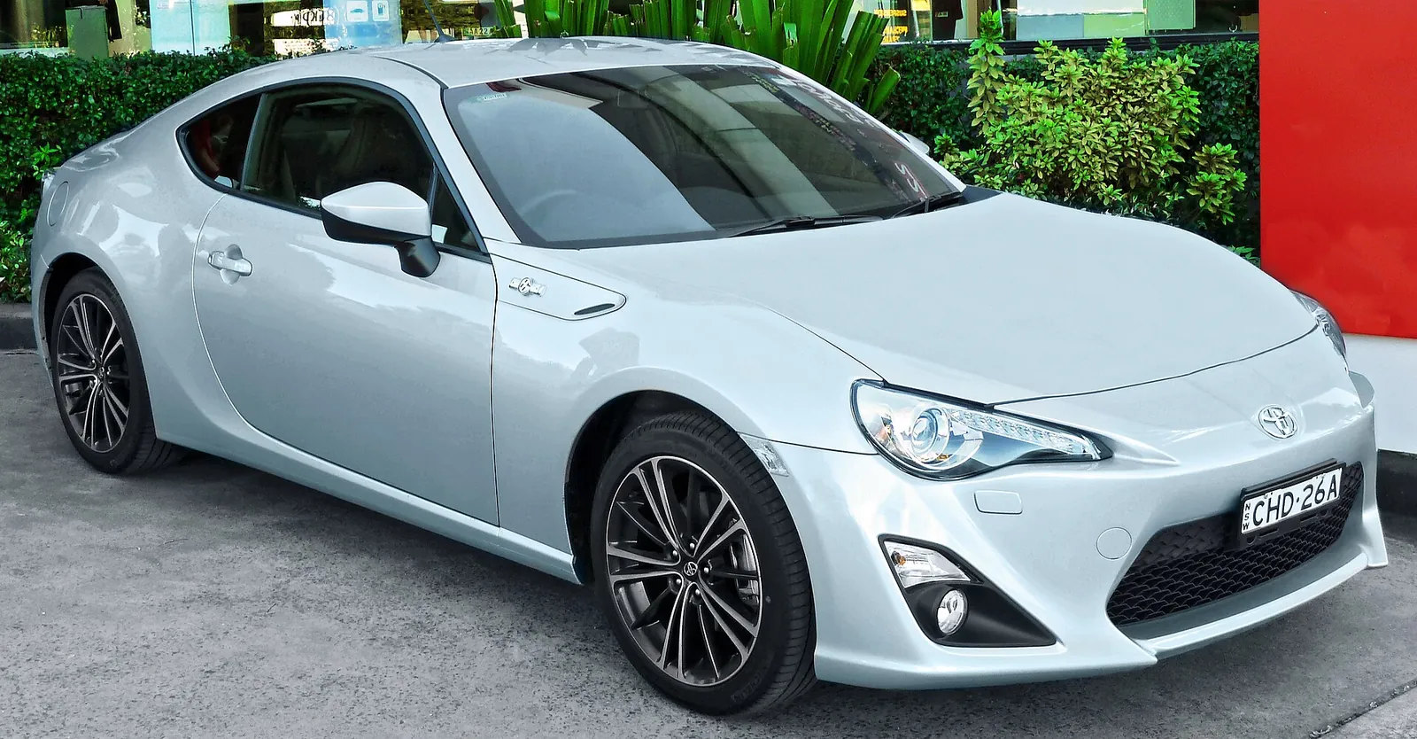 Silver 2012 Toyota 86 GTS coupe at a Toyota dealership in Rockdale, NSW, front three-quarter view