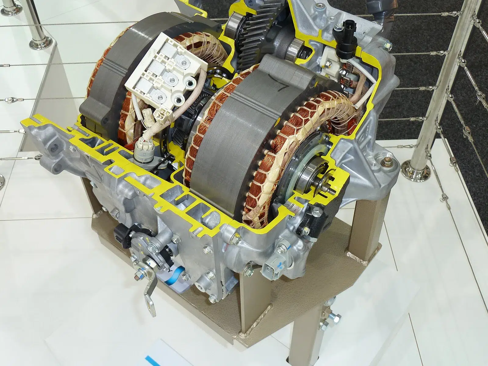 Cutaway of a Toyota hybrid transaxle showing the electric motor windings and planetary power split device