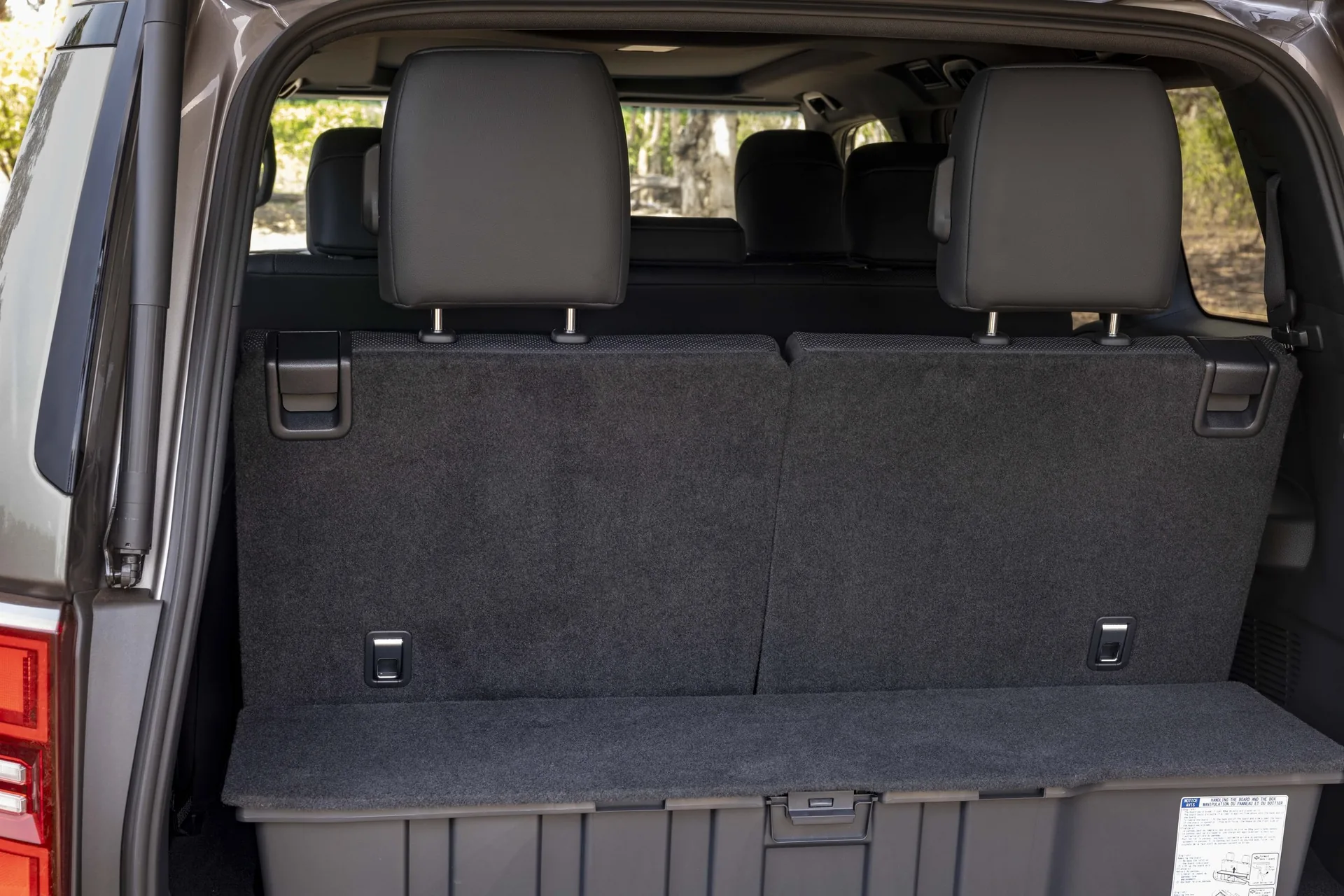 Toyota Prado Kakadu cargo area showing the third-row seats folded on top of the boot floor