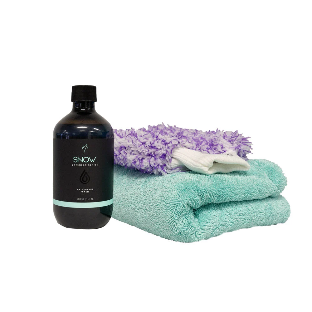 Waxit Car Wash Kit with a bottle of Nv SNOW car wash, a microfibre wash mitt and a large drying towel